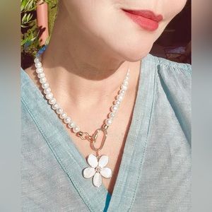 11 mm cultured pearl necklace carabiner clasp mother of pearl plumeria pendant